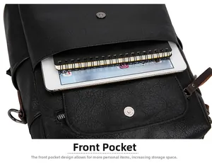 Detailed view of the front magnetic pocket holding a tablet and spiral notebook