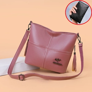 Large soft PU leather shoulder bag for women with tassel and adjustable strap