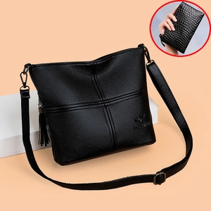 Black litchi leather crossbody bag with kangaroo logo, tassel and matching wallet