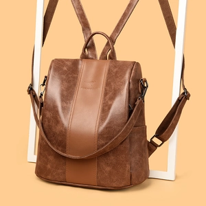 Dark brown PU leather vintage backpack for women with soft texture and large capacity