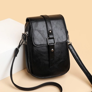Minimalist black PU leather crossbody bag with vintage texture and silver hardware accents