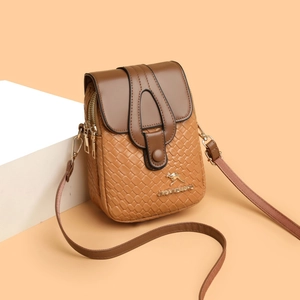 Woven leather crossbody bag with brown color block flap and gold kangaroo logo detail