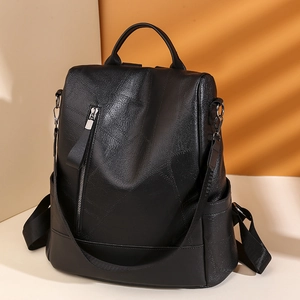 Large capacity black PU leather backpack with lychee texture and anti-theft design