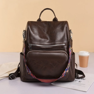Deep brown PU leather backpack with bohemian strap and multi-pocket functional design