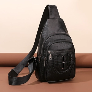 Black pebbled PU leather chest bag with woven edges and adjustable nylon strap