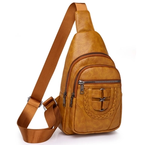 Vintage ginger PU leather crossbody sling bag with triple zipper and braided detail