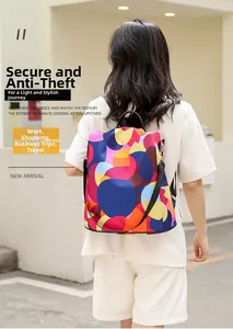 Detail of colorful geometric print oxford backpack with back anti-theft zipper opening