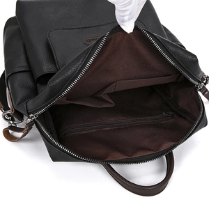 Black pebbled leather backpack with large capacity and organized interior compartments