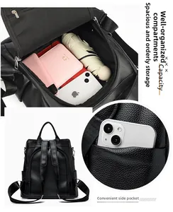 Detailed view of the black faux leather backpack interior compartments and side pockets