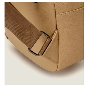 Close-up of pebble leather texture and durable woven strap with metal buckle