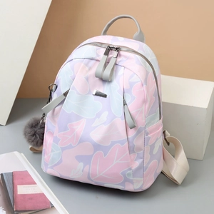 Sac à dos en oxford pour femme avec imprimé floral, pompon gris et tissu imperméable
