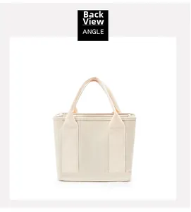Back view of minimalist beige canvas tote bag showing structural support straps