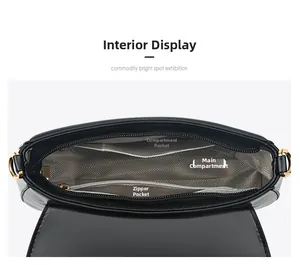 Interior view of black PU leather shoulder bag showing compartments and herringbone lining
