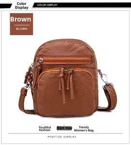 Brown textured PU leather shoulder bag featuring multiple zippered front pockets and hardware