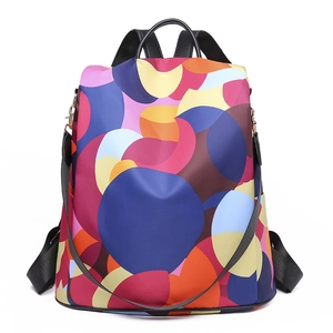 Classic oxford fabric backpack featuring colorful abstract prints and secure theft-proof design
