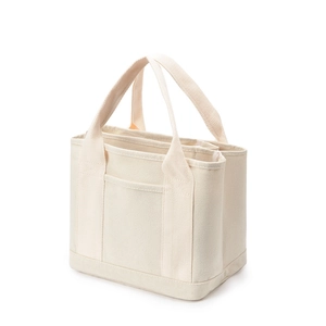 Cream white canvas tote bag with multi-compartment design and reinforced handles