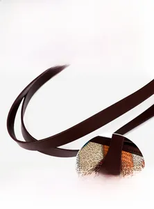 Detail of reinforced handle connection on multicolor patchwork leather tote bag
