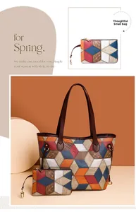 Detail of the multi-colored patchwork tote bag showing crocodile texture and metal buckle