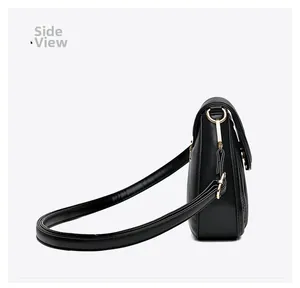 Side view of black quilted PU leather shoulder bag with golden D-ring and V-stitch detail