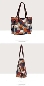 Macro view of multi-color geometric patchwork tote with high-quality leather texture