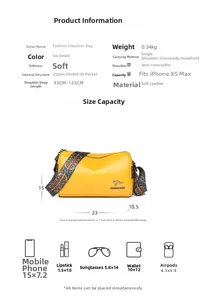 Detail of yellow PU leather crossbody bag showing large capacity and woven shoulder strap