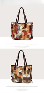 Detail view of large tote bags in red and brown geometric patchwork textured PU leather