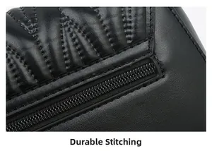 Close-up of reinforced stitching and textured black PU leather with zipper detail