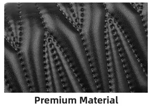 Detail of premium black PU leather showing wavy quilted texture and fine stitching
