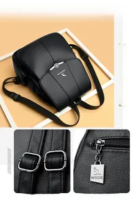 Close-up of litchi texture PU leather, silver hardware, and kangaroo metal logo on backpack