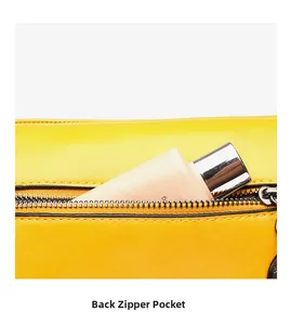 Detail of yellow PU leather bag featuring a functional back zipper pocket for cosmetics