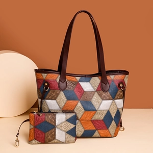 Women's patchwork tote bag and clutch set with colorful geometric patterns in PU leather