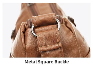 Detail of silver square hardware buckle and reinforced stitching on brown leather bag