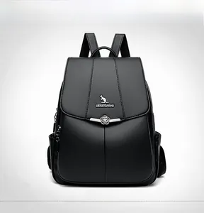 Front detail of black leather backpack featuring floral silver lock and kangaroo metal logo