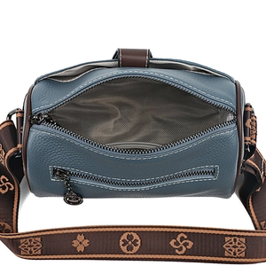 Sac Boston en cuir bleu avec bandoulière rétro jacquard et vue intérieure spacieuse
