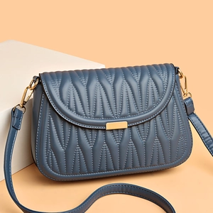 Navy blue textured PU leather crossbody bag with wave stitching and gold buckle closure