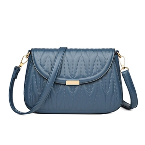 Modern dark blue quilted PU leather shoulder bag with gold hardware and flap closure