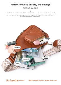 Brown vintage leather chest bag showing spacious interior with woven geometric strap