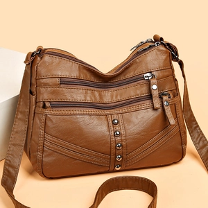 Women's vintage brown soft leather crossbody bag with multiple zip pockets and studs