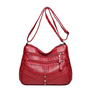 Vintage dark red soft leather crossbody bag with multiple zippers and rivet accents