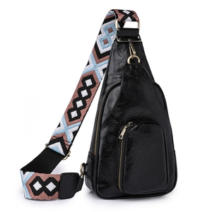Vintage black leather chest bag with bohemian style colorful pattern wide strap