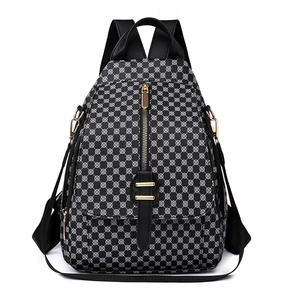 Sac à dos femme noir avec motifs géométriques blancs et fermetures éclair dorées