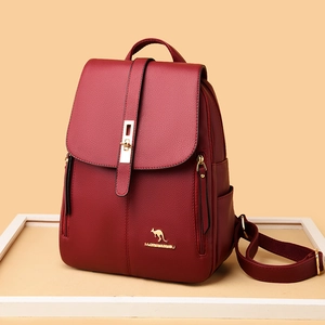 Burgundy faux leather backpack for women with gold kangaroo logo and anti-theft design