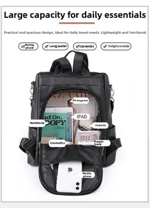 Interior storage of black PU leather backpack showing capacity for laptop and A4 files
