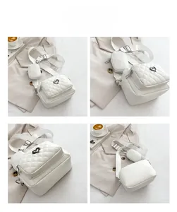 White quilted PU crossbody bag set showing front, side and back angles on display