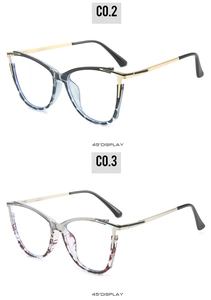 Detail view of cat-eye frames with spring hinges and patterned temples at a 45-degree angle