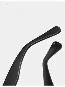 Macro detail of ergonomic curved black eyeglass temples for comfortable daily wear