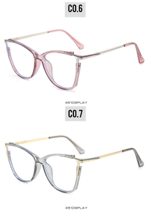 Cat eye glasses frames in translucent pink and grey with spring hinges at 45 degree angle