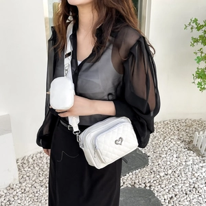 White quilted PU leather crossbody bag set with heart detail and small round coin purse