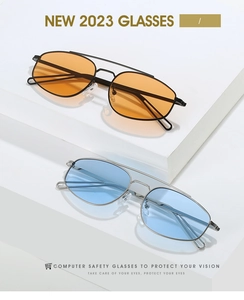 Retro pilot sunglasses with silver and black metal frames and colorful protective lenses