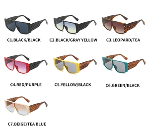 Detail view of square sunglasses featuring signature quilted texture temples in multiple colors